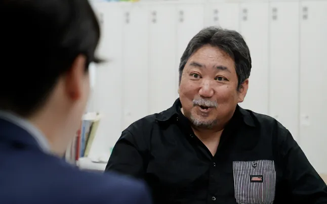 青山さんを信頼する小野さん